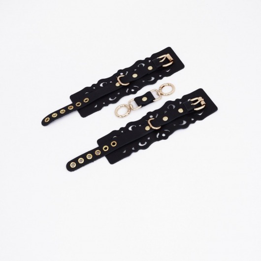 Черные кожаные наручники с узорами и золотистой фурнитурой - Crazy Handmade - купить с доставкой в Северске